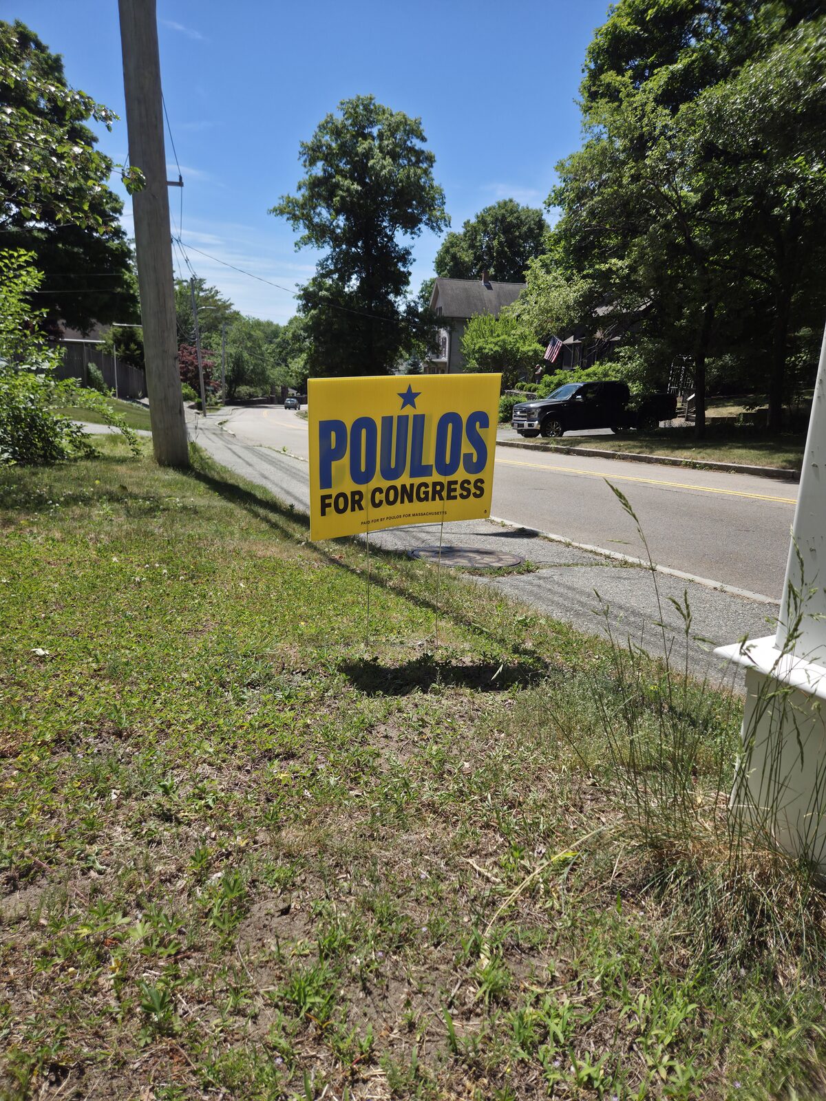 A Poulos for Congress lawn sign in a supporter's front yard in MA-04